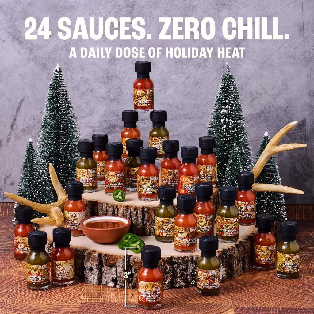 All 24 mini bottles stacked in a pyramid among bottle-brush trees