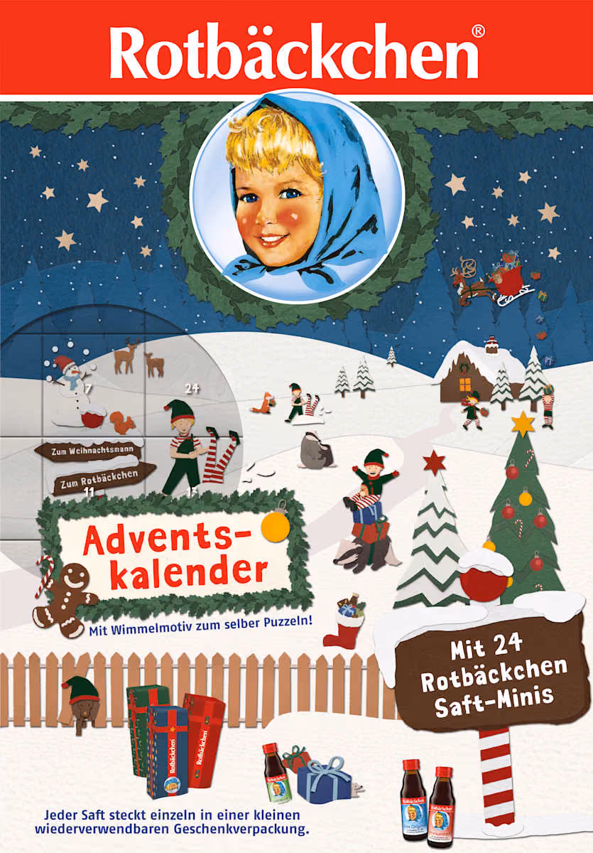 The front of the box drawn as a snowy village scene with elves and numbered doors