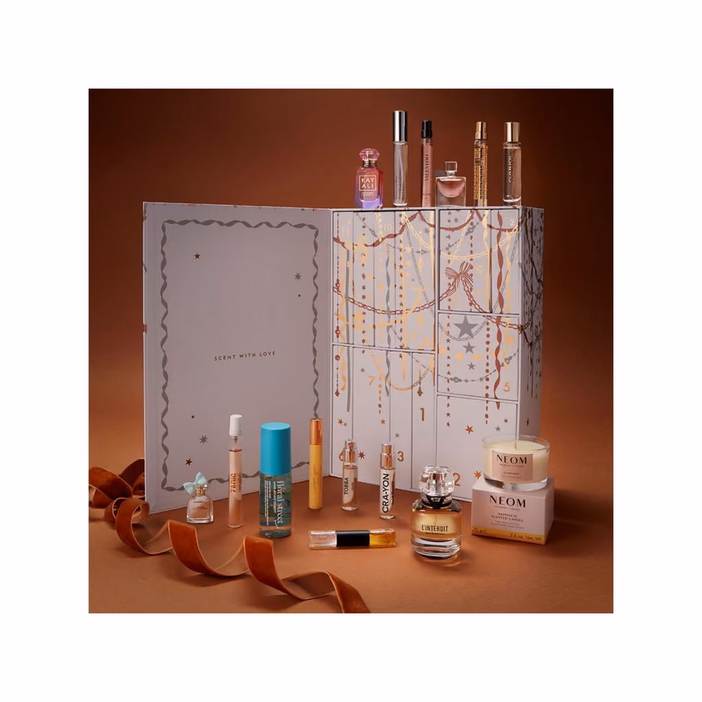 The 12 Days of Scent box on a set with its bottles around it