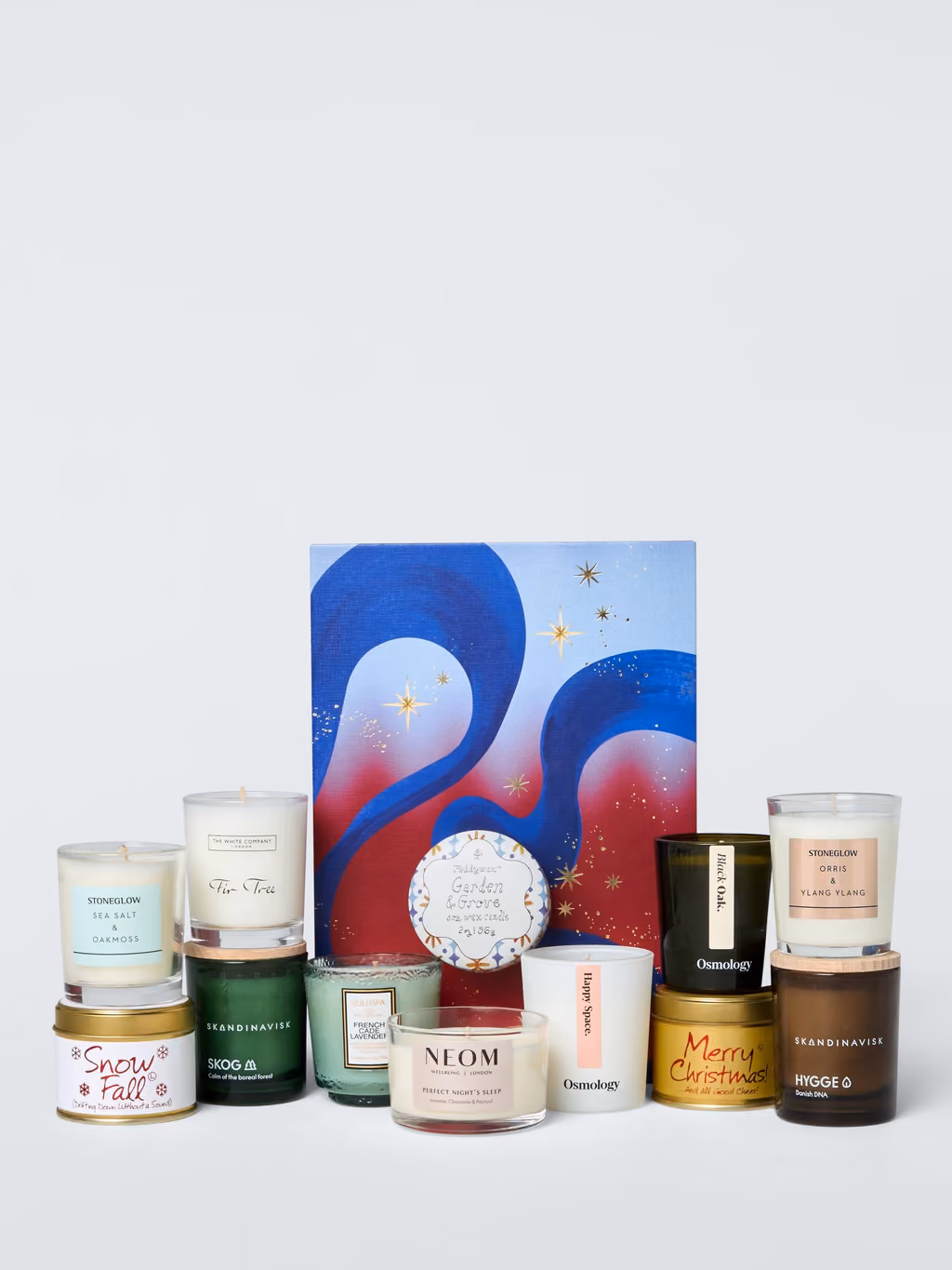 All twelve candles lined up in front of the box