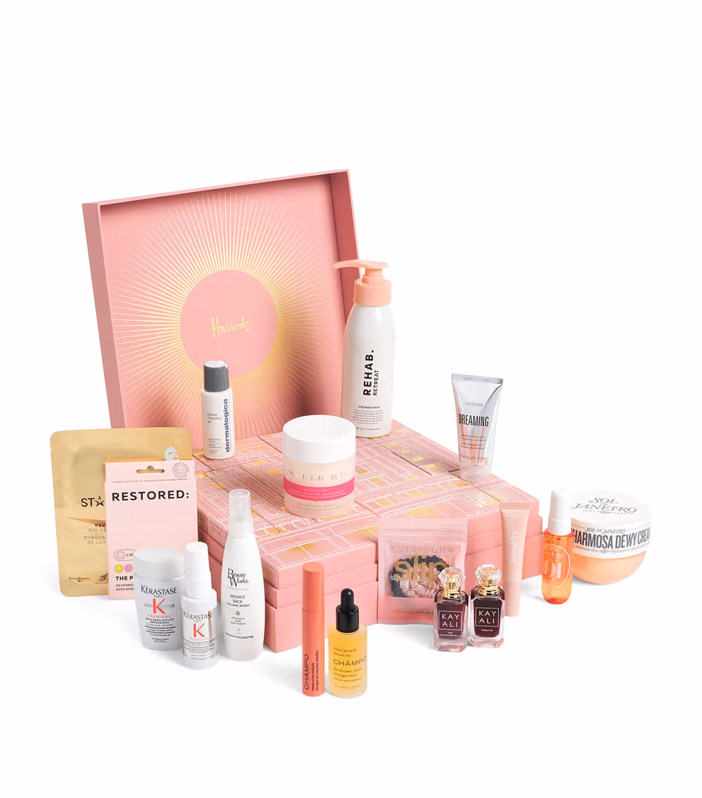The Harrods 12 Days of Hair & Body box open with its 18 pieces
