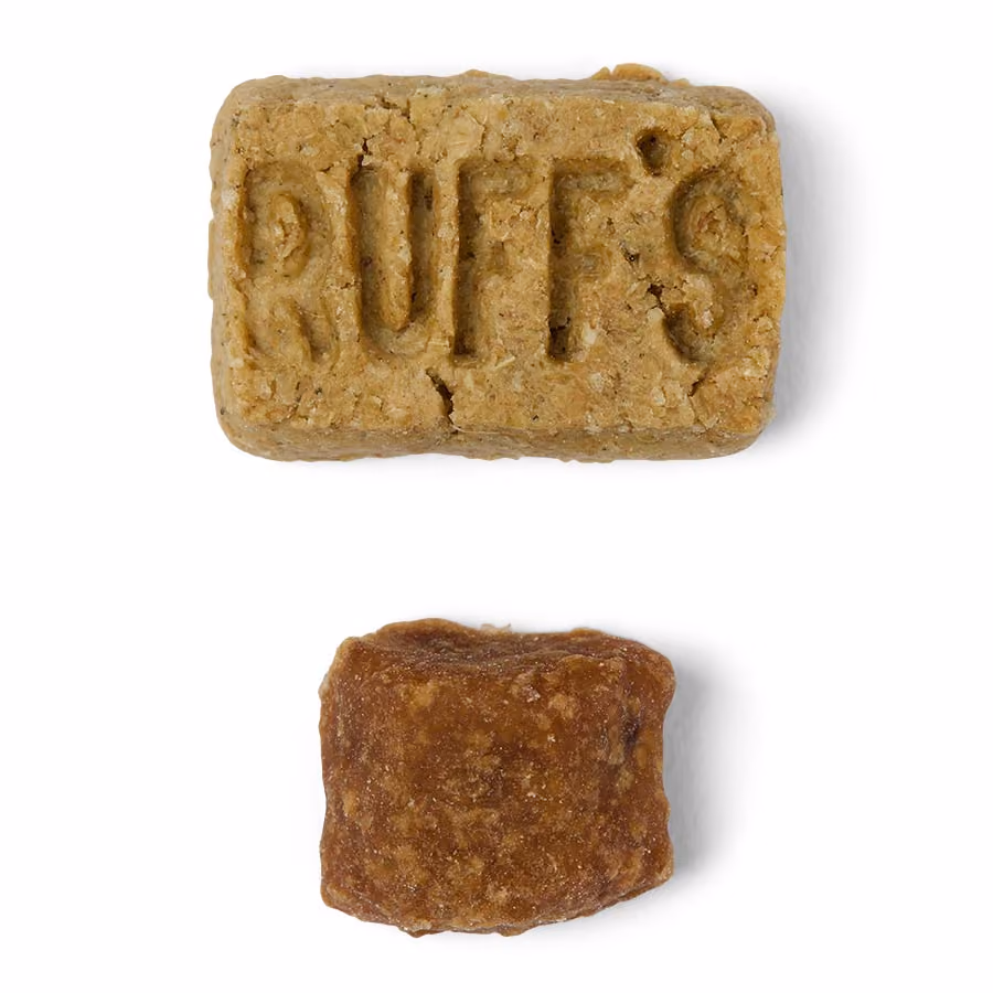 One oat biscuit and one 3 Bird Roast bite, close up