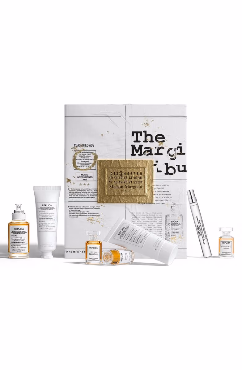 The Maison Margiela REPLICA 7-Day Holiday Calendar with its seven pieces in front of the box