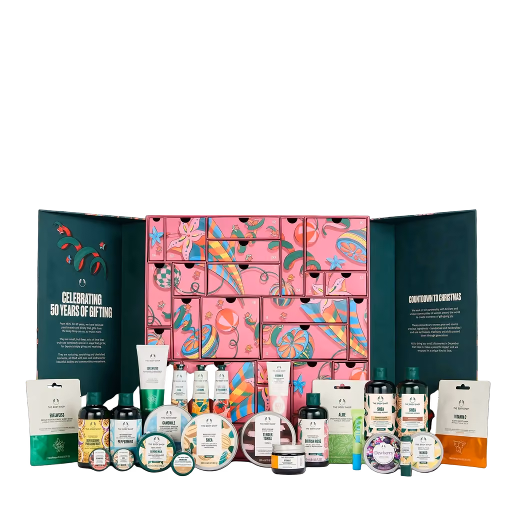 The Ultimate calendar open with its 25 products lined up in front of it