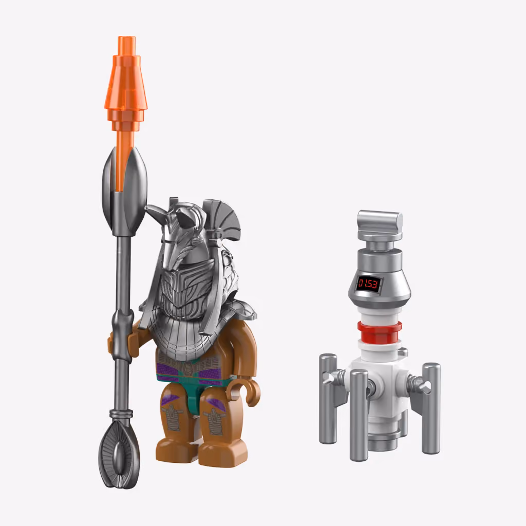 A Jaffa guard minifigure with staff weapon beside a small grey model