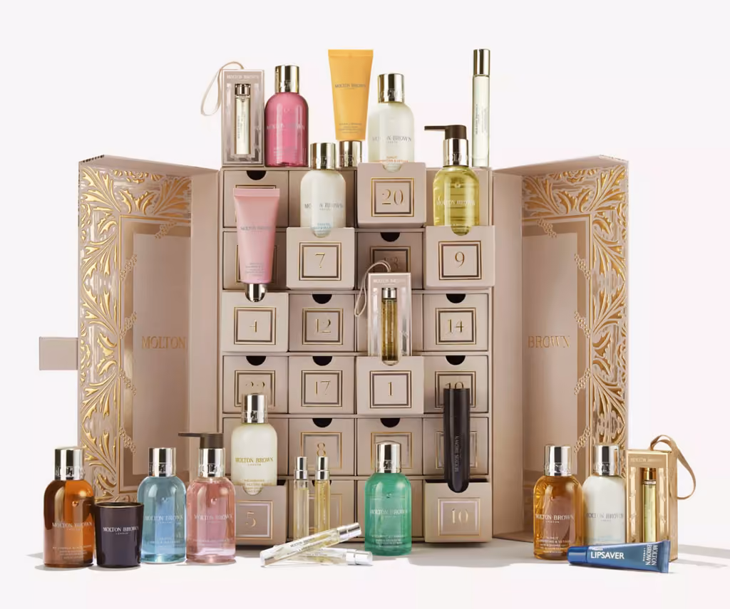 The Molton Brown 2025 cabinet open with the 24 pieces in front