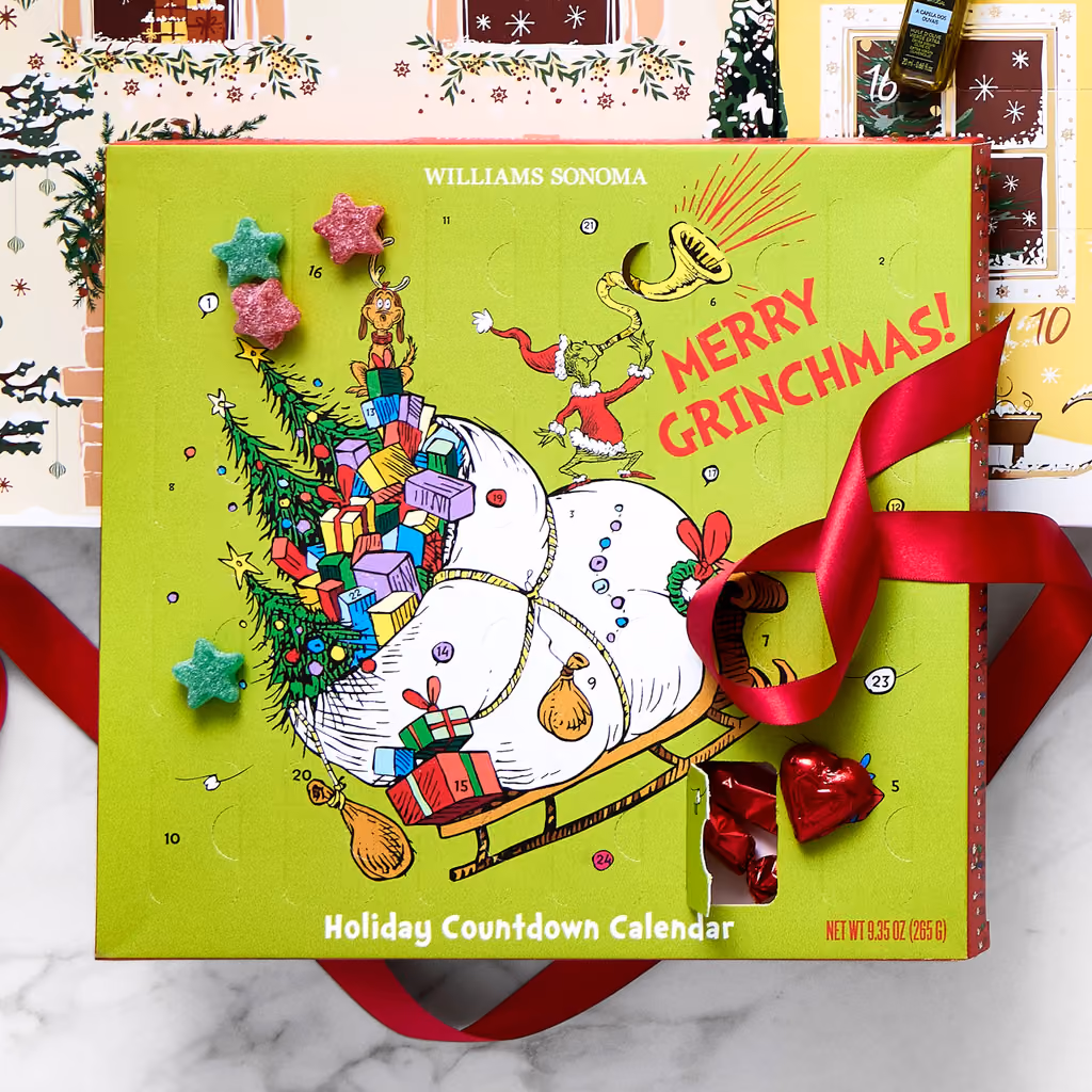 The Grinch x Williams Sonoma advent calendar with a red ribbon