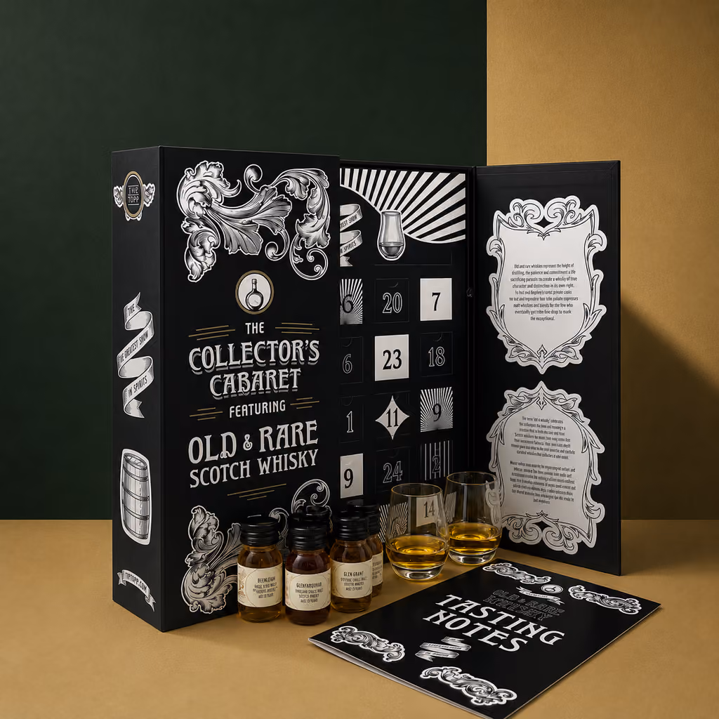 The open box with three drams, two glasses of whisky and the tasting notes booklet in front