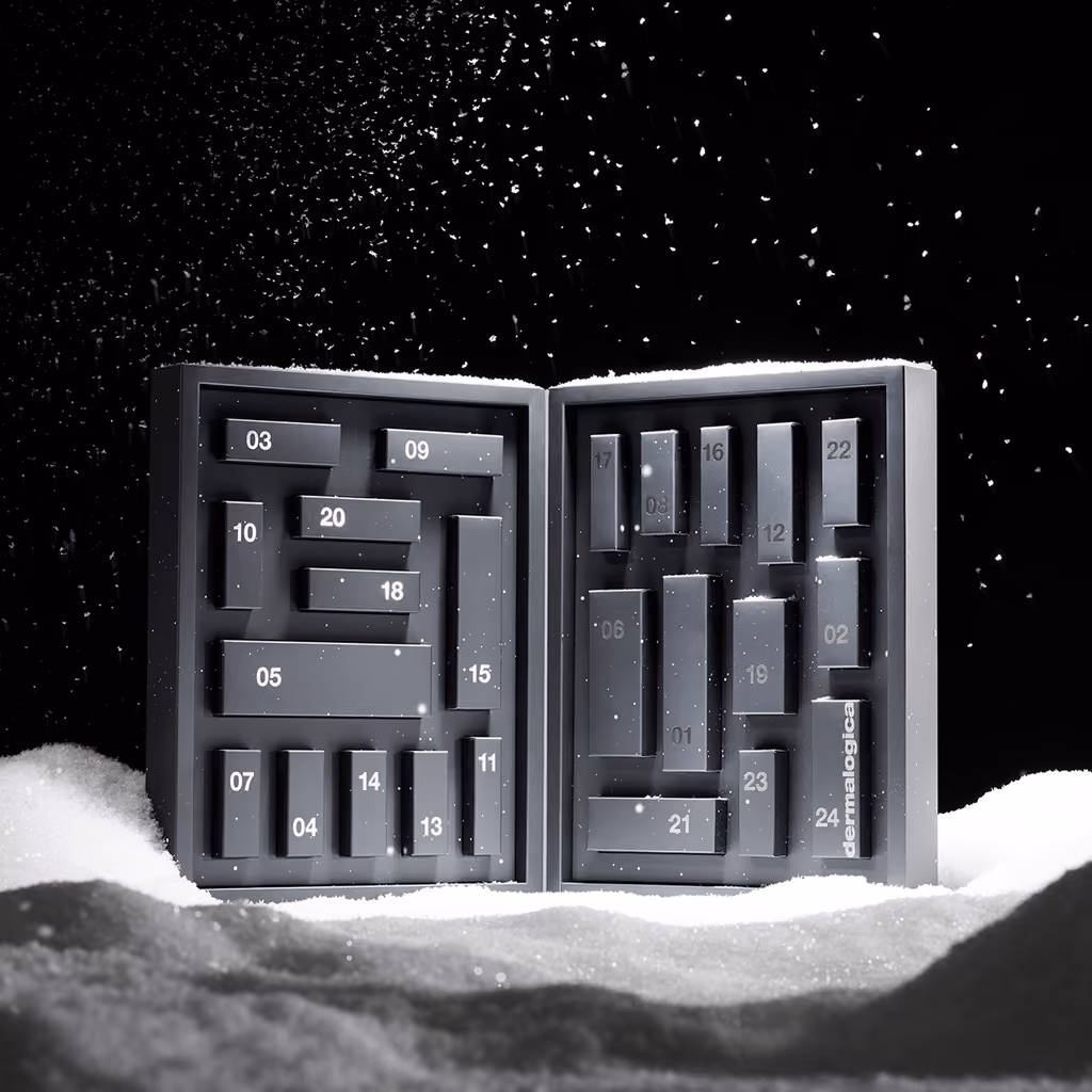 The box open, its 24 numbered drawers in two halves
