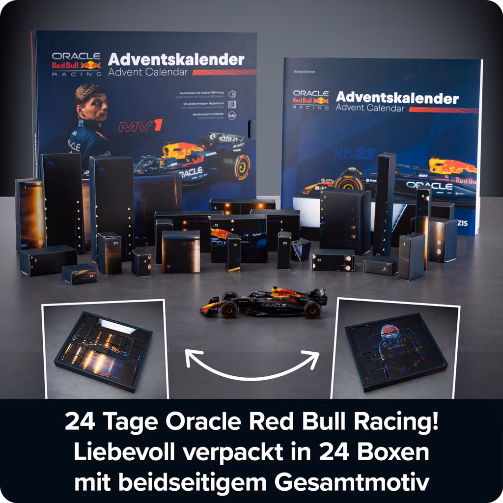 The 24 black boxes laid out between the calendar and the handbook, with the finished RB21 model in front