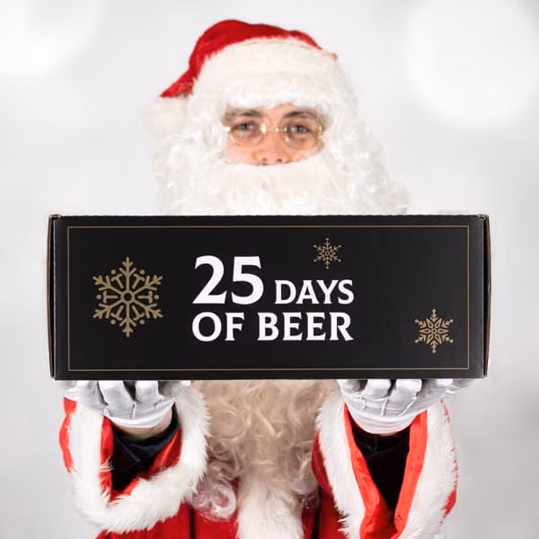 Santa holding the 25 Days of Beer box