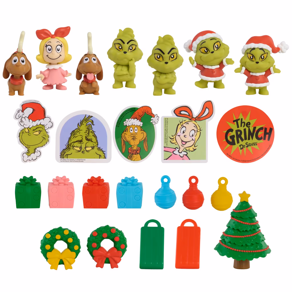 Grinch, Max and Cindy Lou Who figures with stickers and small presents on white