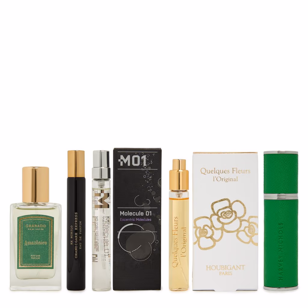 Granado, Escentric Molecules and Houbigant bottles and a green travel case lined up