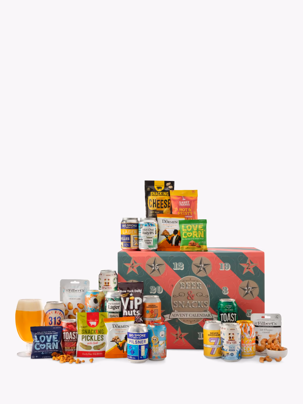The beers and snacks piled in front of the box with a glass of beer