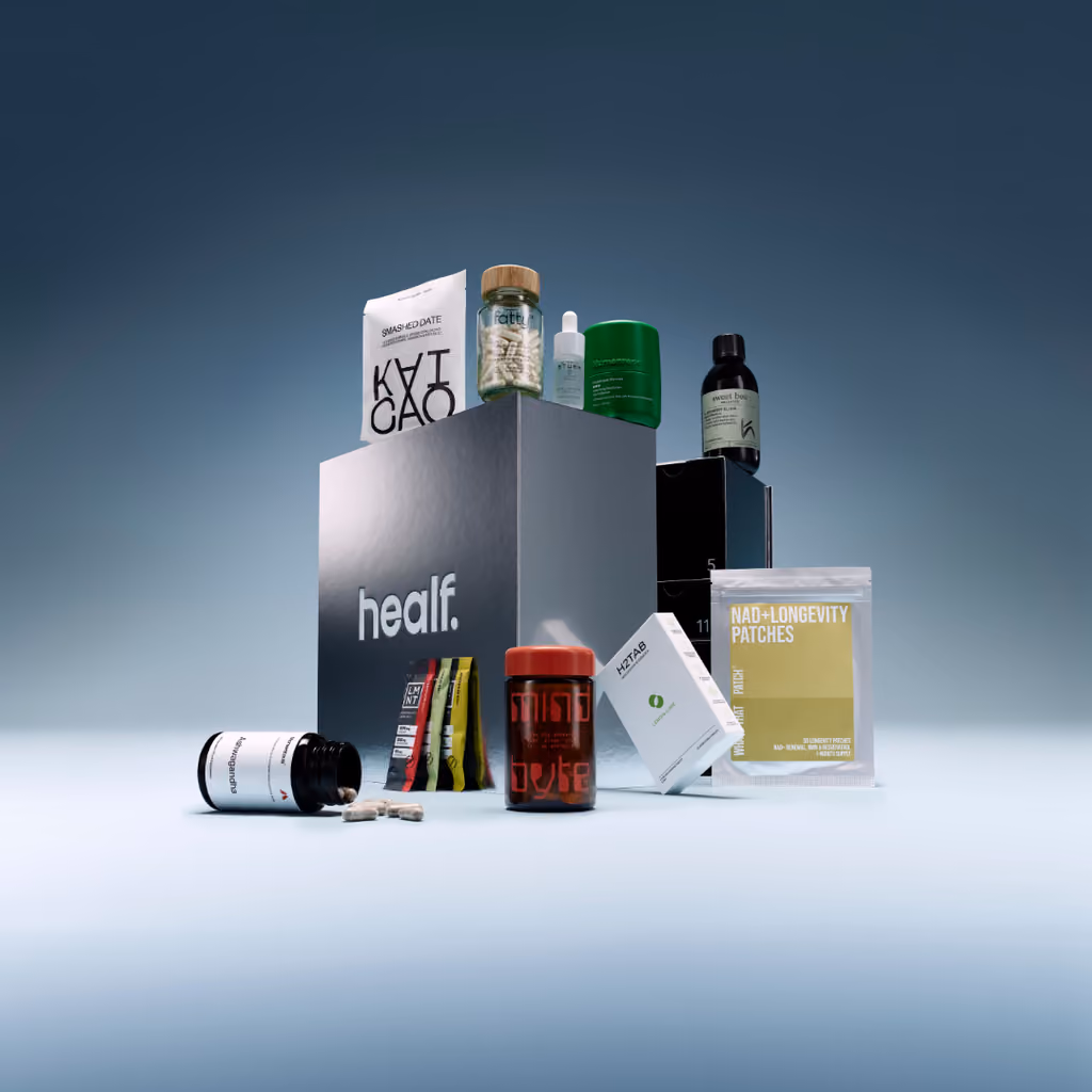 The Healf cube with supplements, skincare and patches spilling out of it