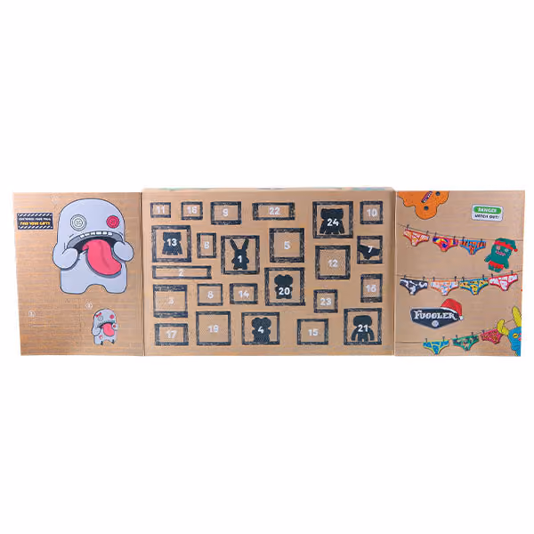 The Fuggler calendar opened flat, the 24 numbered doors on the kraft board with stickers and cards printed around them