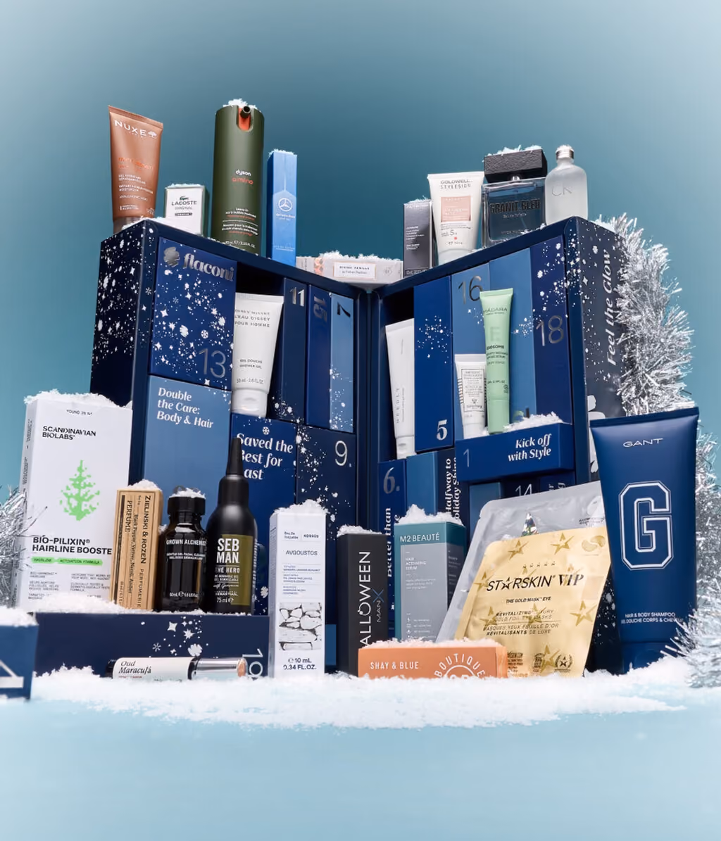 The flaconi Men's Edition 2026 box open, its numbered drawers pulled out with the products in them