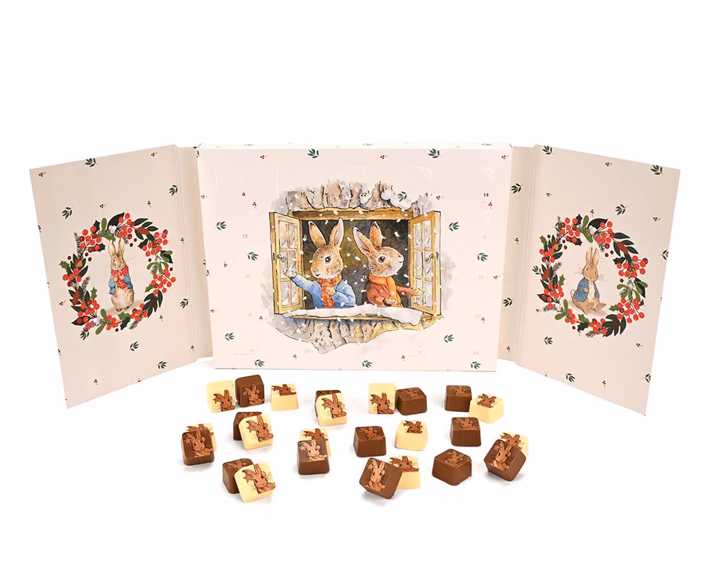 The Peter Rabbit calendar opened, with its printed milk and white chocolates