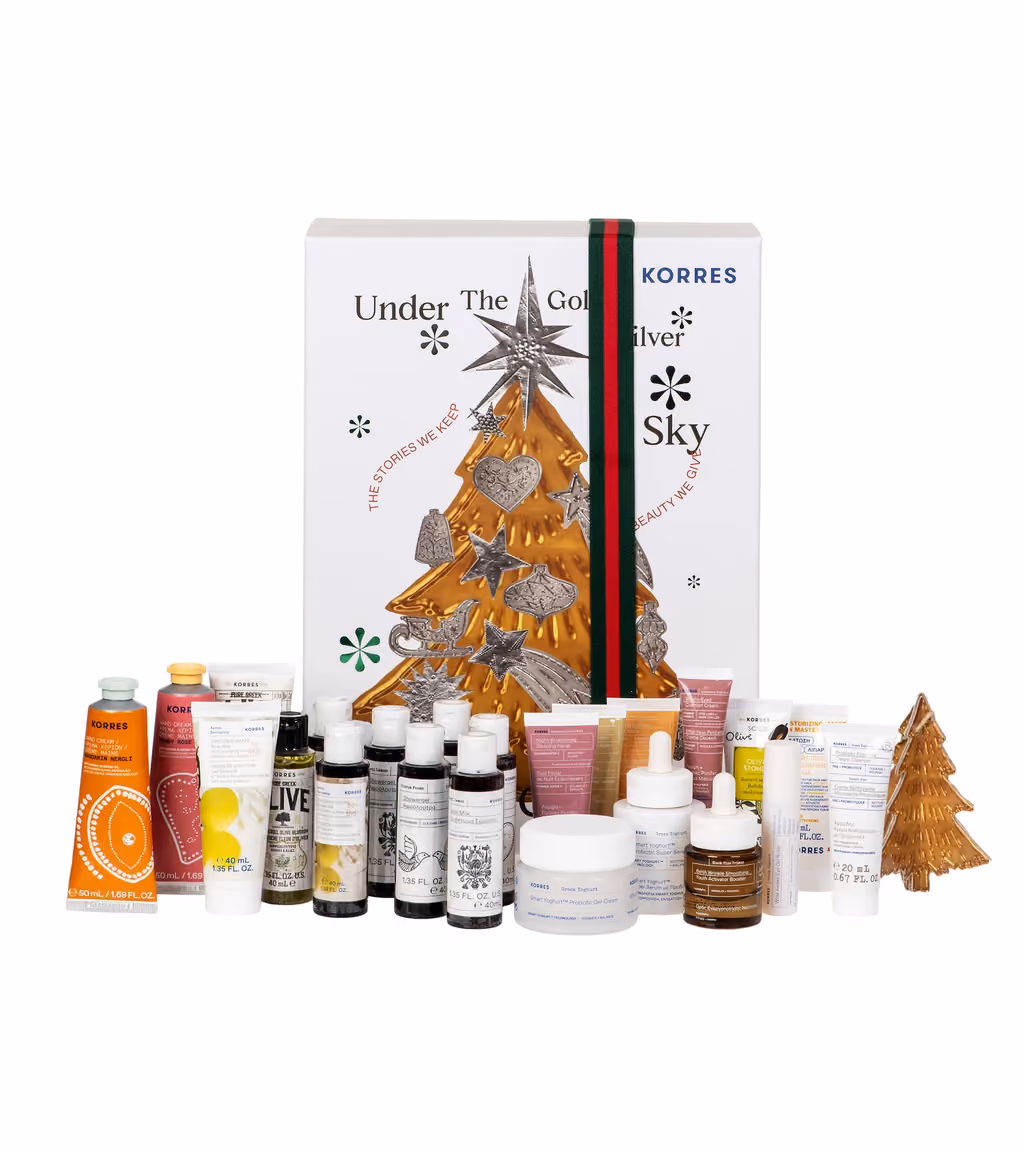 The KORRES 2026 calendar with its 24 products lined up in front of the box