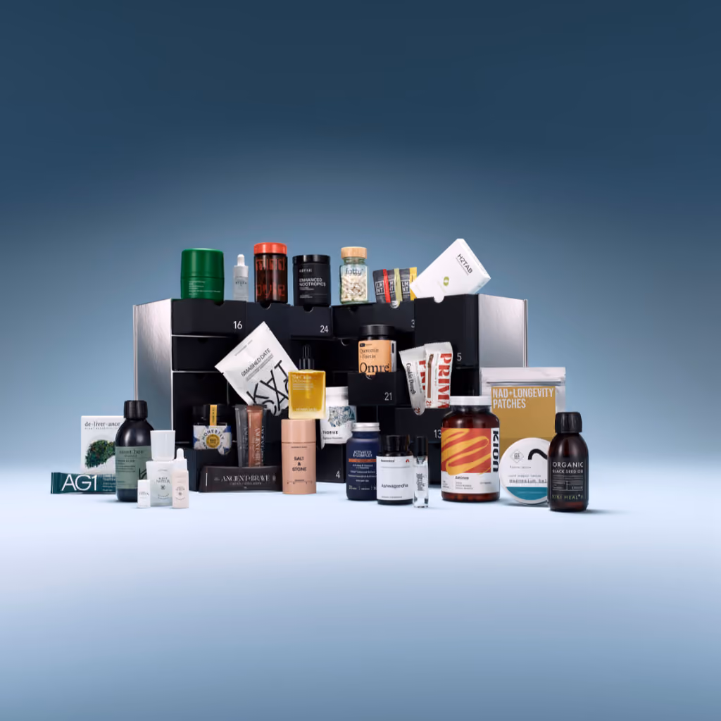 The calendar open with its 25 products lined up in front of the numbered doors