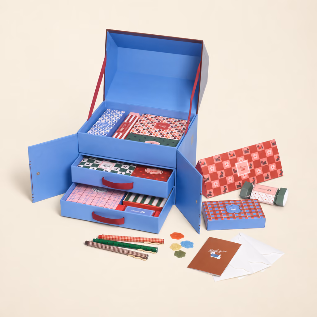 The 12 Day house box open with its stationery in front