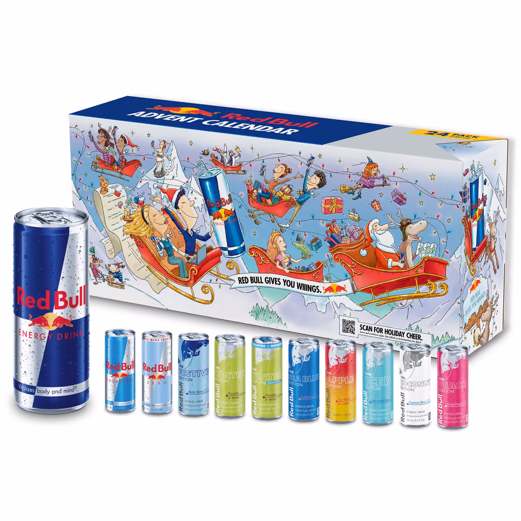 The long blue box with the eleven flavours of can lined up in front of it
