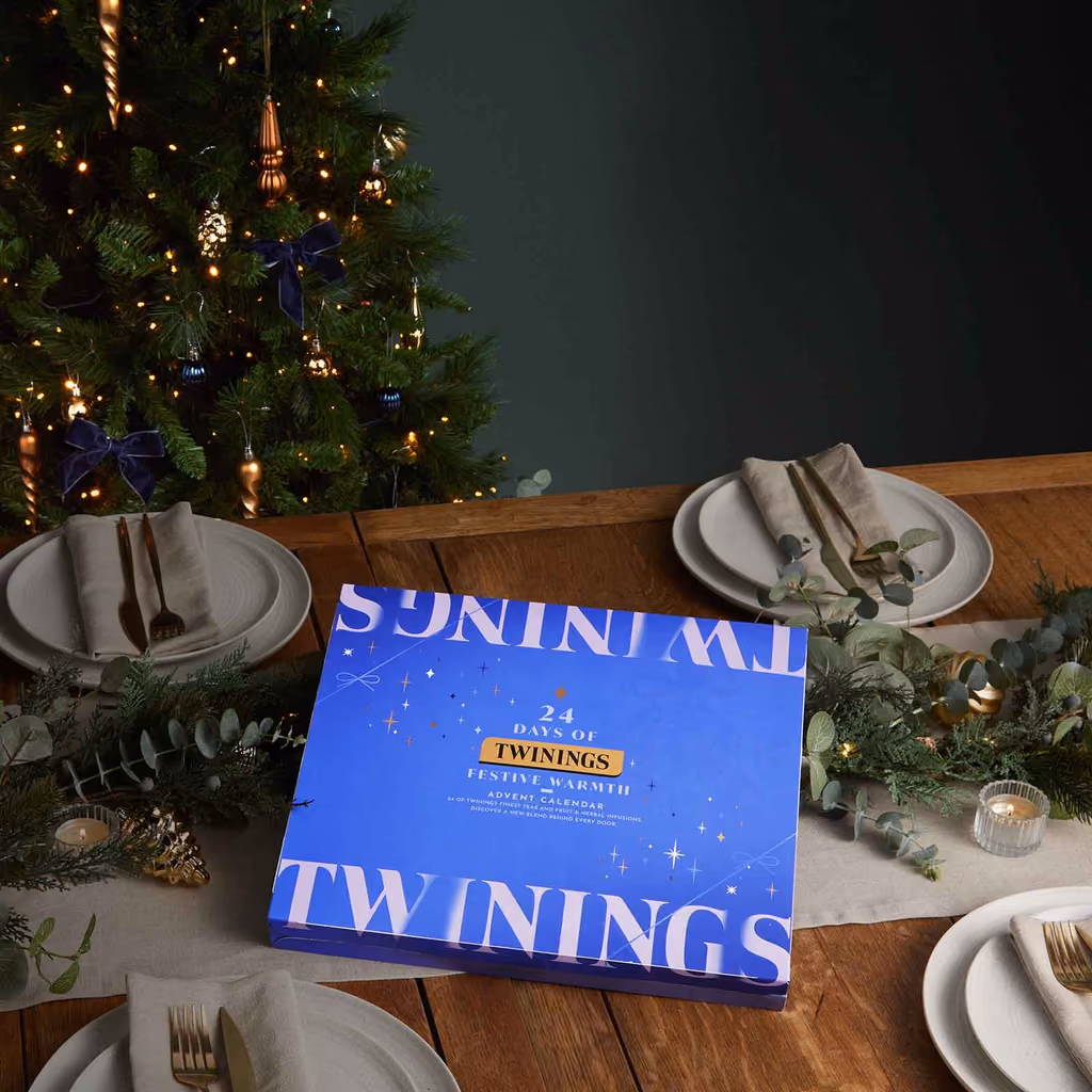 The Twinings box standing on a laid table