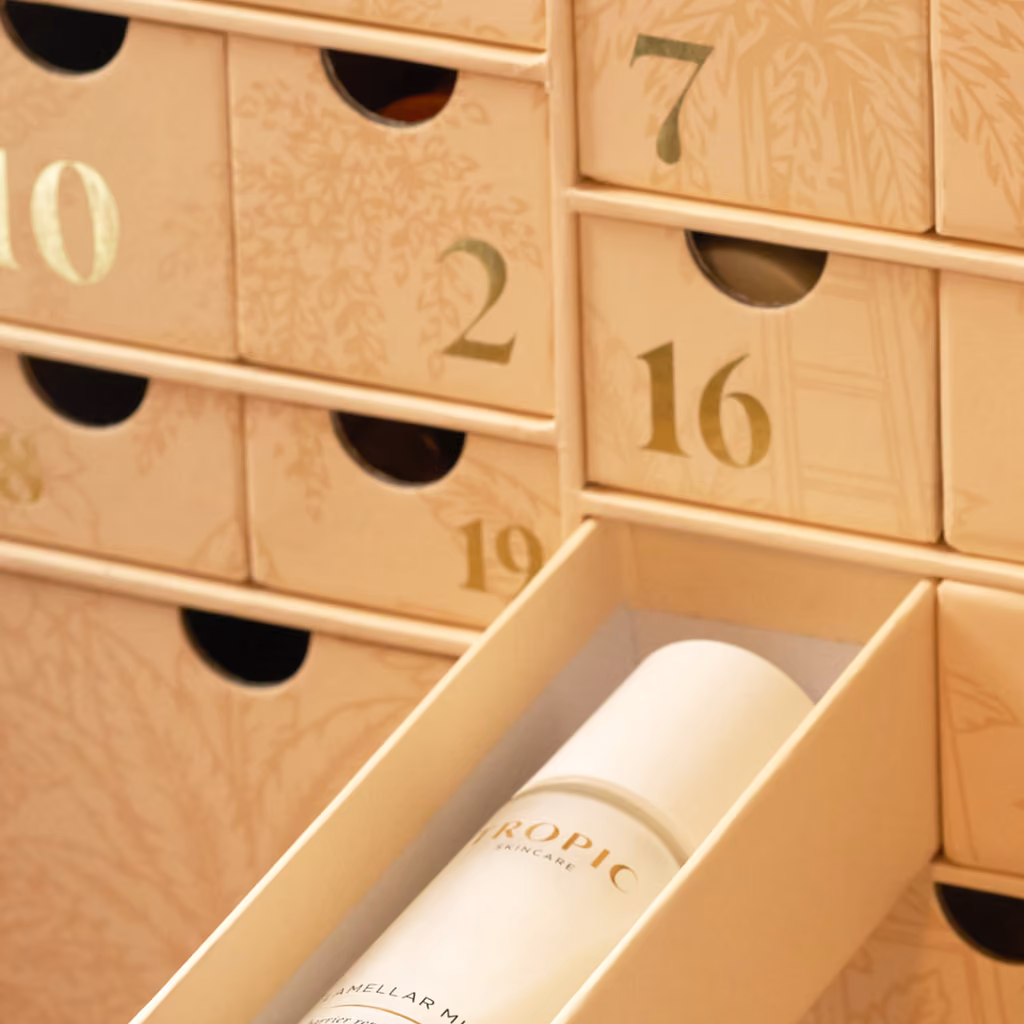 A drawer of the Tropic 2026 calendar pulled out with the Lamellar Milk essence inside