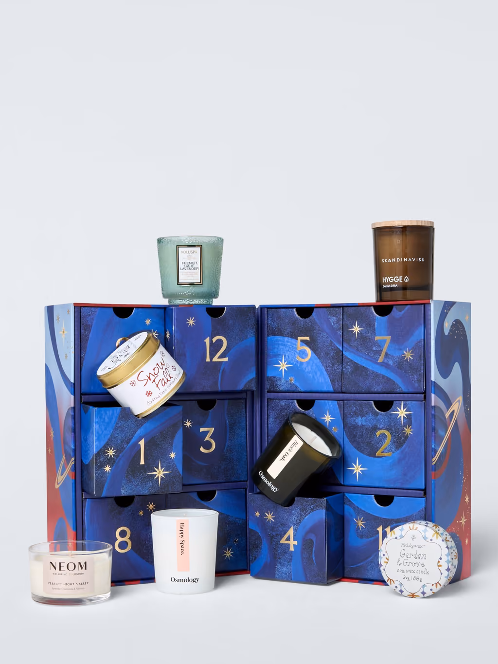 The John Lewis candle calendar with its drawers open and candles pulled out
