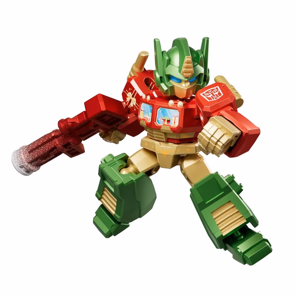 The Christmas Optimus Prime in an action pose with its blaster