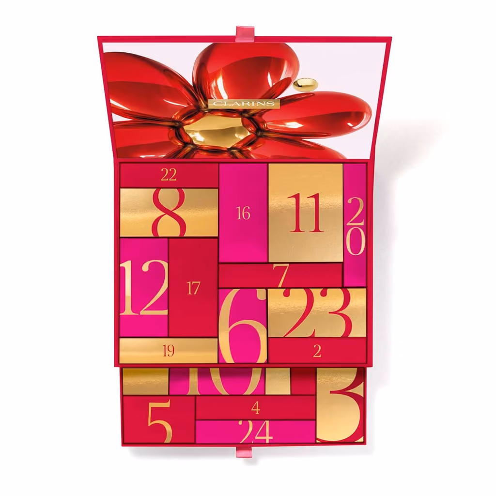 The box open, its 24 numbered doors in red, pink and gold