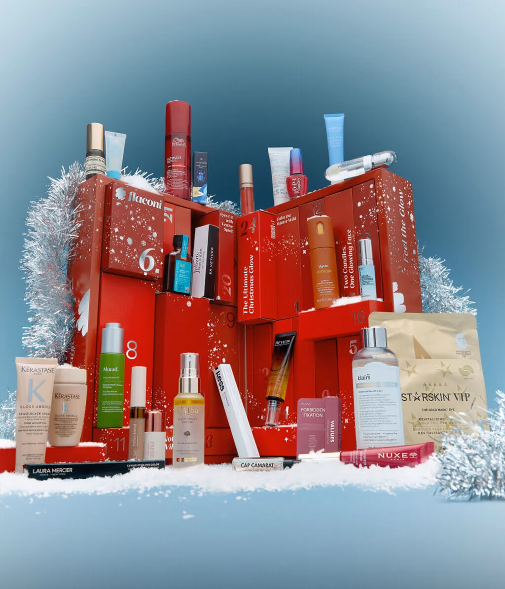 The flaconi 24 Love Brands 2026 box open, its numbered drawers pulled out with the products in them