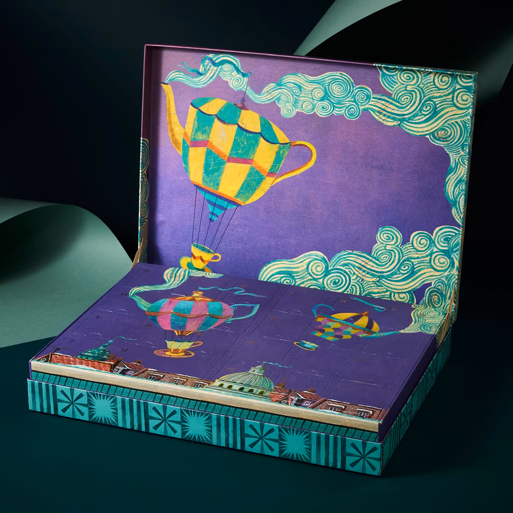 The Tea Advent Calendar lid open, teapot balloons printed inside