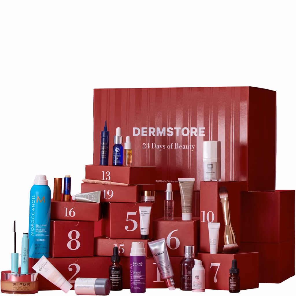 The crimson Dermstore box with its drawers pulled out and the products standing in front
