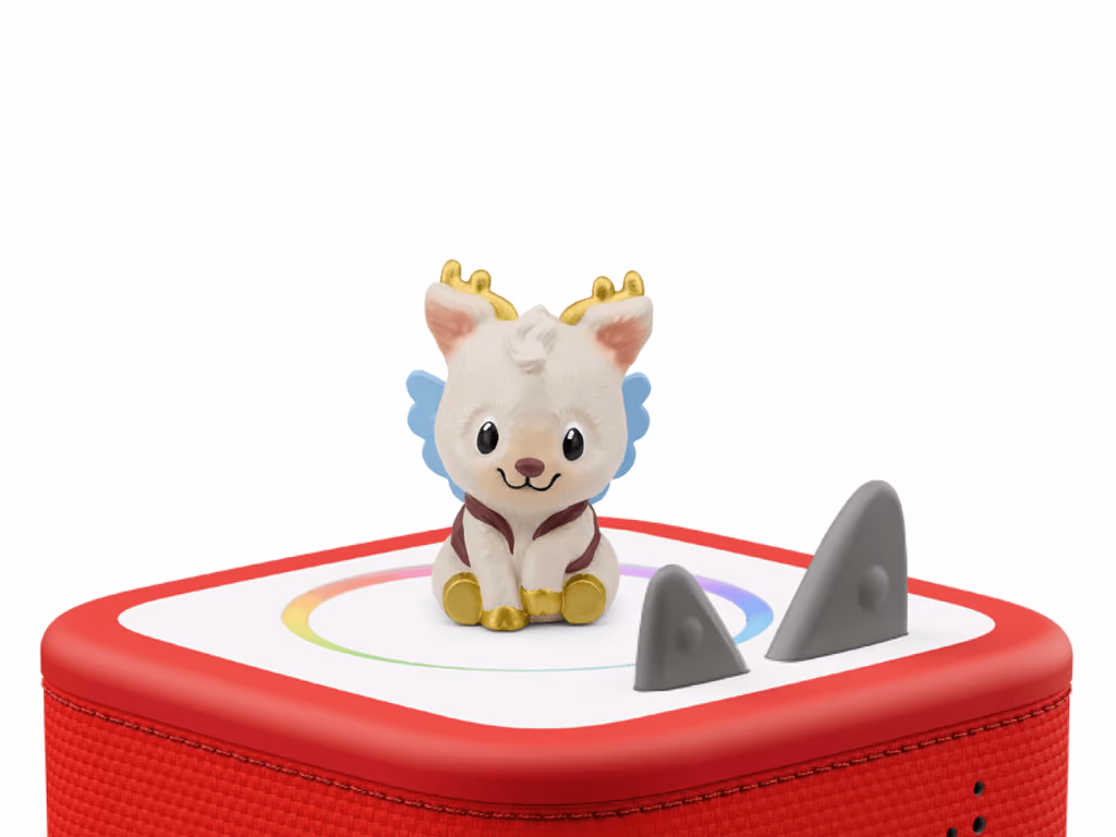 The Holly Tonie standing on a red Toniebox