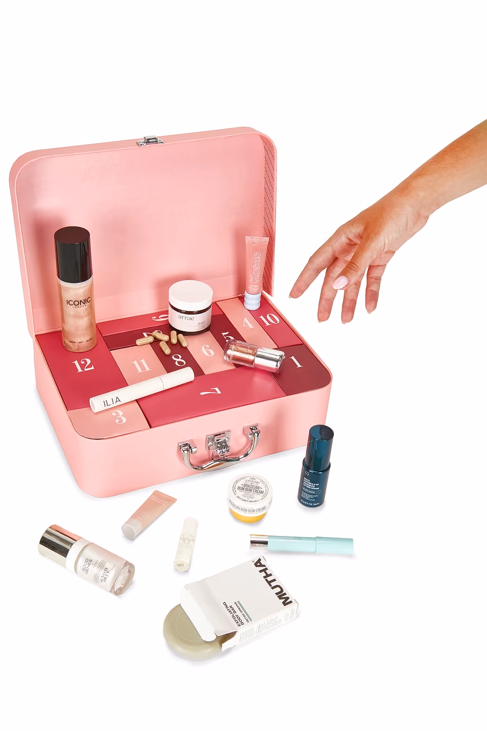 The twelve products of the 12 Days of Revolve Beauty calendar laid out