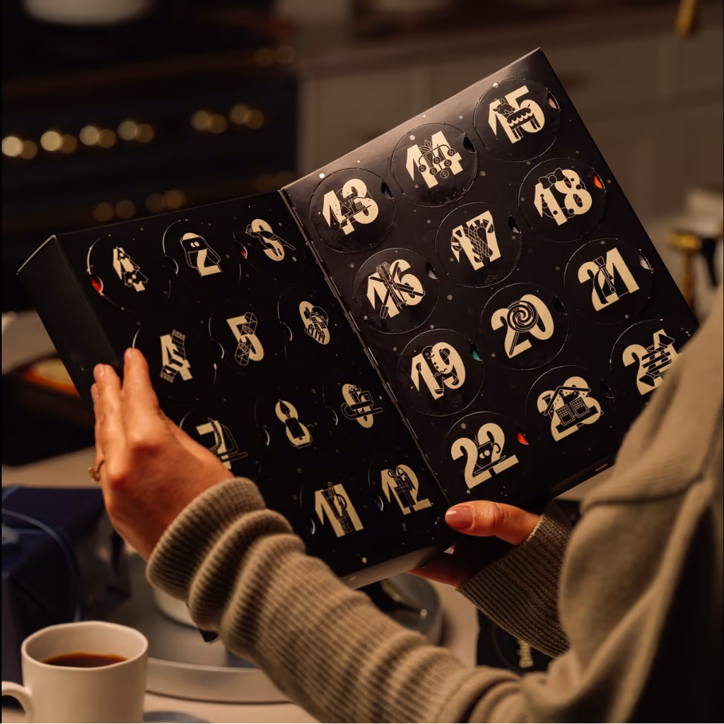 The box opened out like a book on its 24 round numbered doors