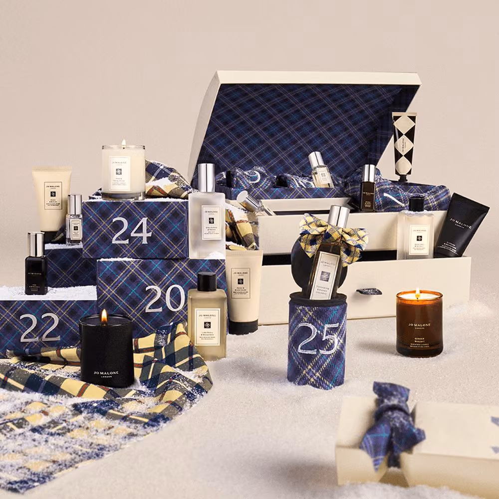 The trunk on a snowy set with numbered parcels and a candle around it