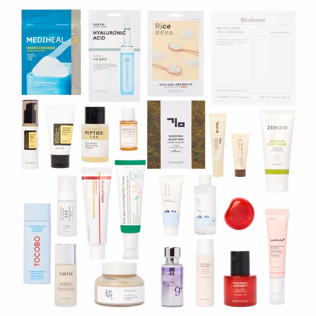 All 26 products laid out on white, sheet masks along the top row